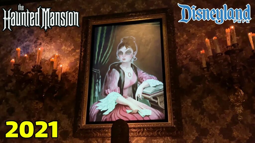 NEW 2021 ENHANCED Haunted Mansion | Disneyland | Full Ride Through | <p>
Dearly depart into a foreboding estate, drag your body to the dead center of the Portrait Chamber and watch as the walls begin to stretch before your eyes. Climb into your waiting Doom Buggy and embark on a shivering journey into an unearthly realm.
The disembodied voice of the Ghost Host is your private guide through the cadaverous dwelling—home to grinning ghosts and other spectral surprises.
Glide past a rattling casket in the conservatory. Head off to Madame Leota’s spooky séance room. Float by the Grand Ballroom and its waltzing apparitions. Take a spin through a cemetery where the spirited residents regale you with song.
Beware of lurking hitchhikers—these phantom pranksters may try to follow you home!</p>
<p>• Queue Enhancements:
• Extended Queue Photos:
• Disneyland Reopening:
• The Haunted Mansion: </p>
<p>• DLR Landing Page:
• Disneyland: </p>
<p>*Connect With Us*
• Facebook:
• Instagram:
• Twitter:
–––––––––––––––––––––––––––––––––
#LaughingPlace #Disneyland #HauntedMansion</p>