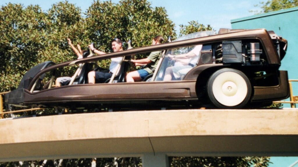 Rocket Rods Testing & 1998 Ride (New Tomorrowland Views) - Front Row POV with Queue 2000, Disneyland | Rocket Rods opened at Disneyland in 1998 and closed just over 2 years later. This is video from multiple days - early 1998 during testing; from a POV ride with New Tomorrowland views also in 1998; and then a walk-through of the queue with the film and vintage ride vehicles, down the tunnel and a full front row POV ride in 2000!