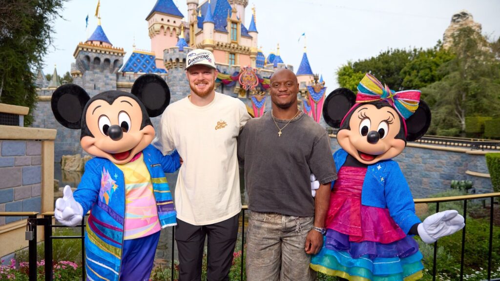 Sam Darnold and Kenneth Walker at Disneyland Park