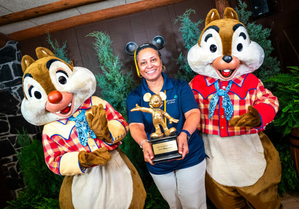 Chip and Dale pose with a Disney Grant recipient