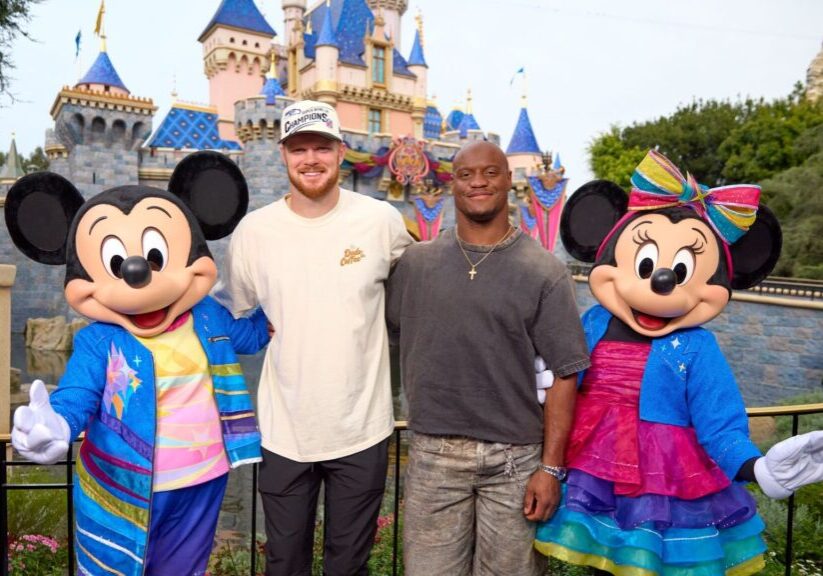 Sam Darnold and Kenneth Walker at Disneyland Park